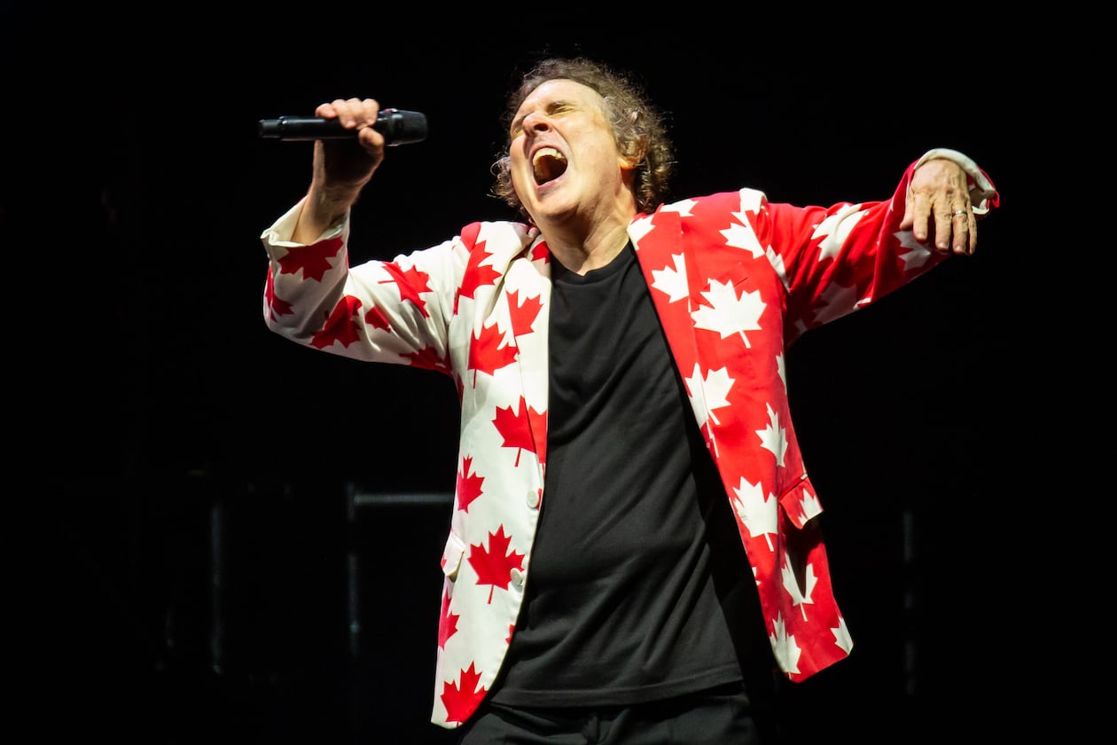 Alpharetta, Ga: "Weird Al" Yankovic playing "Canadian Idiot" at Ameris Bank Ampitheatre. Yankovic played a stunningly wide array of his humorous songs Sunday night along with matching costume changes and video montages. Photo taken Sunday May 31, 2026 at Ameris Bank Amphitheatre. 060126 weird al (RYAN FLEISHER FOR THE ATLANTA JOURNAL-CONSTITUTION)