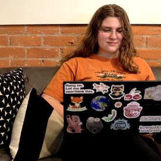Zoe Lloyd, a 21-year-old student at Northern Arizona University, works from her laptop at Sosta in Flagstaff, Ariz., on Monday, April 20 2026. (AP Photo/Cheyanne Mumphrey)