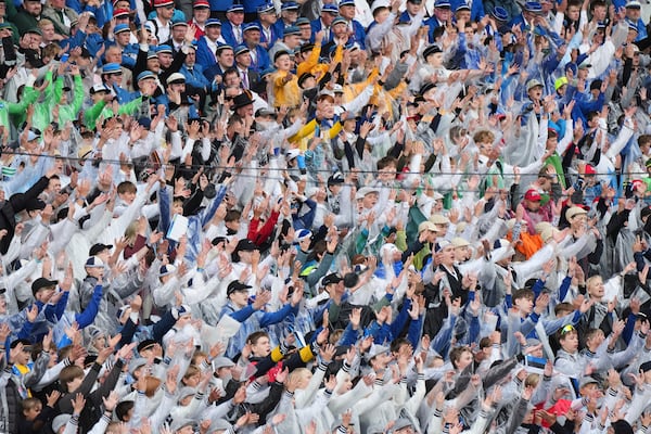 Choir singers attend the "Iseoma" Song and Dance Celebration at the Song Festival Grounds in Tallinn, Estonia, on Sunday, July 6, 2025. (AP Photo/Sergei Grits)