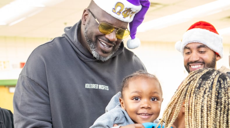Shaquille O’Neal stopped by a holiday toy giveaway Thursday in South Fulton.