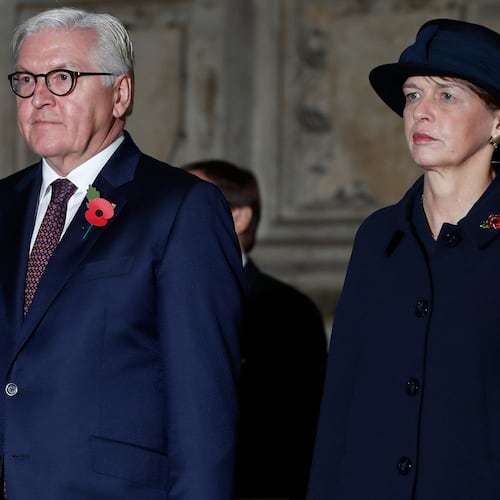 FILE - German President Frank-Walter Steinmeier, front left, and his wife, Elke Budenbender, right, leave Westminster Abbey in London, England, Nov. 11, 2018. (AP Photo/Alastair Grant, File)