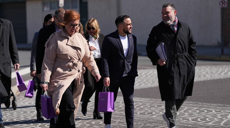 Lancaster Pa., Mayor Jaime Arroyo speaks with attendees at the ribbon cutting for a Finanta Credit Union in Reading, Pa., Wednesday, April 8, 2026. (AP Photo/Matt Rourke)