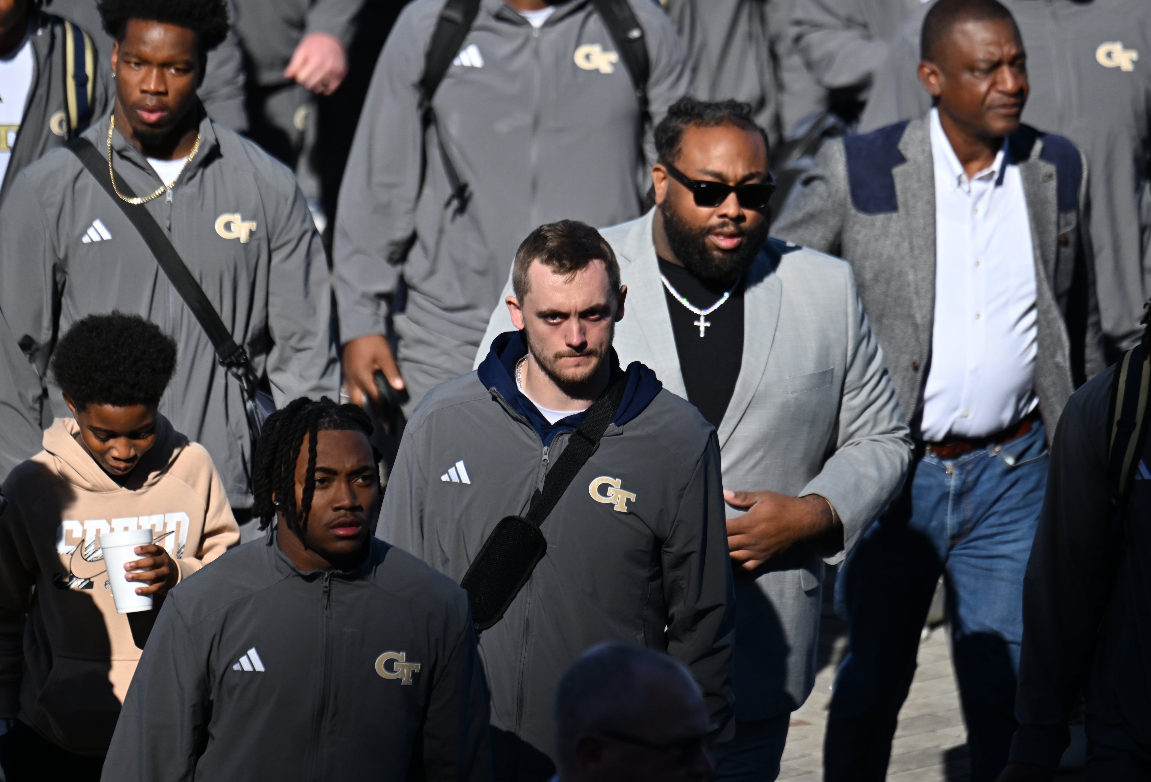 Georgia Tech quarterback Haynes King arrives with teammates before the start of the Georgia Tech vs Georgia football game at Mercedes-Benz Stadium, Friday, Nov. 28, 2025 in Atlanta. (Hyosub Shin/AJC)