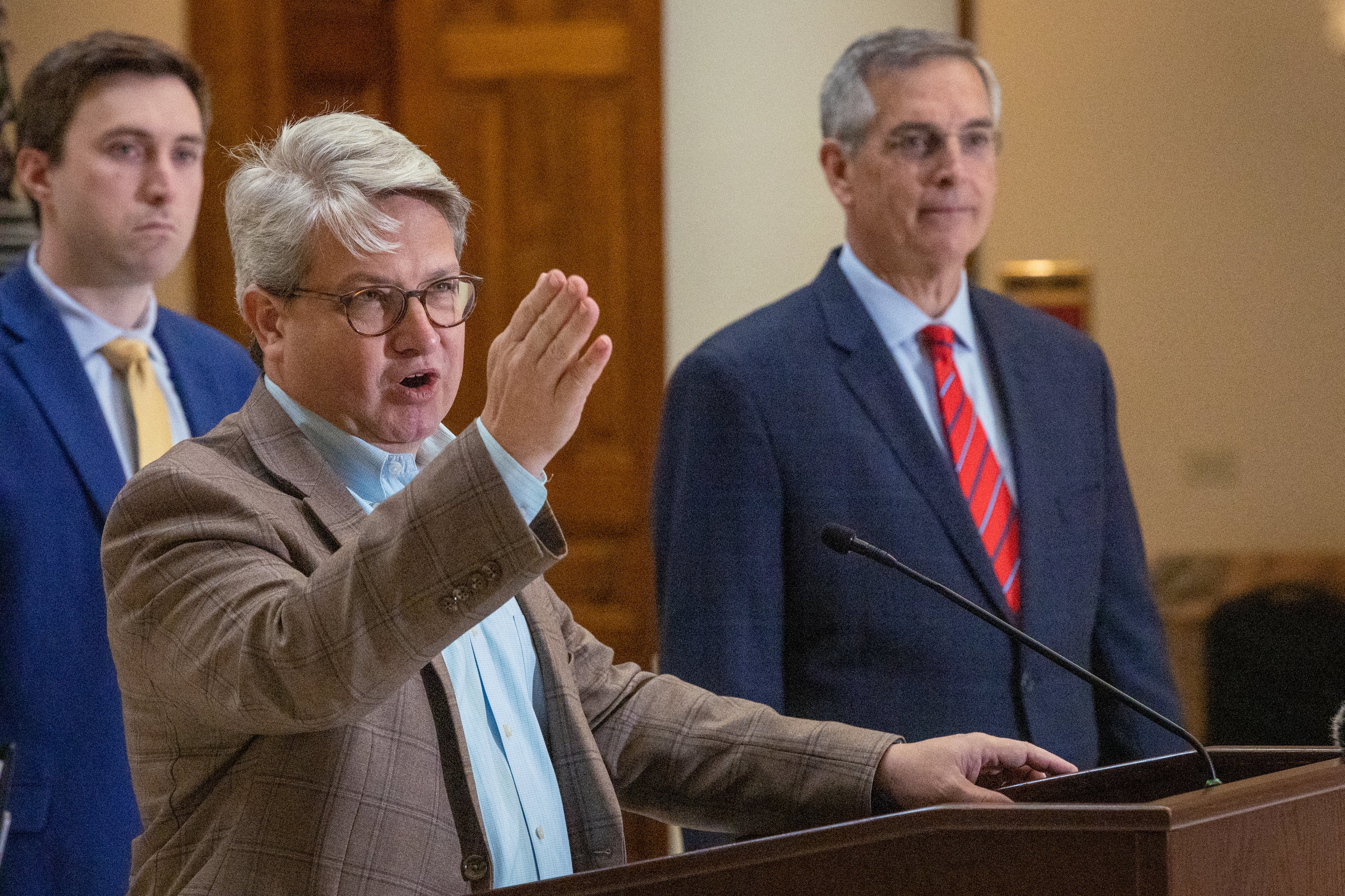 Gabriel Sterling spoke at a 2022 news conference as Blake Evans (left) and Secretary of State Brad Raffensperger listen.