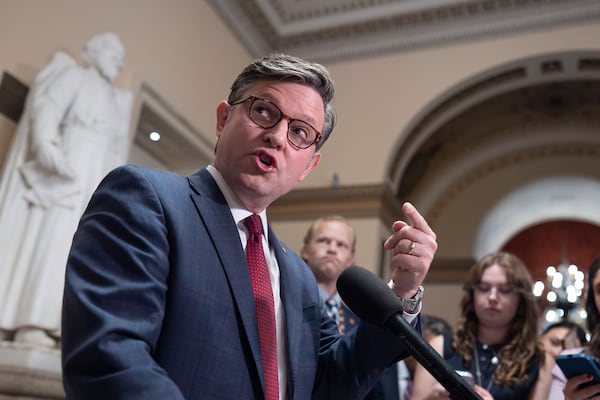 Speaker of the House Mike Johnson, R-La., talks to reporters Thursday at the Capitol after the House failed to temporarily extend FISA, the law that allows the U.S. to gather intelligence abroad. (J. Scott Applewhite/AP)