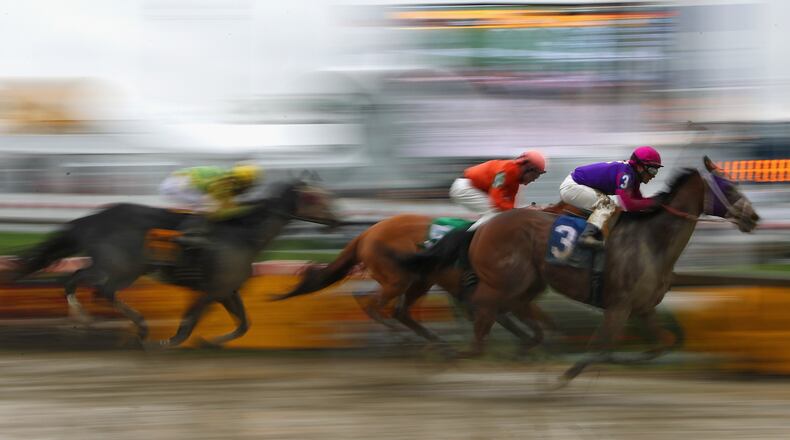 BALTIMORE, MD - MAY 21: Homeboykris ridden by Horacio Karamanos leads the field in a race prior to the 141st running of the Preakness Stakes at Pimlico Race Course on May 21, 2016 in Baltimore, Maryland. (Photo by Patrick Smith/Getty Images)