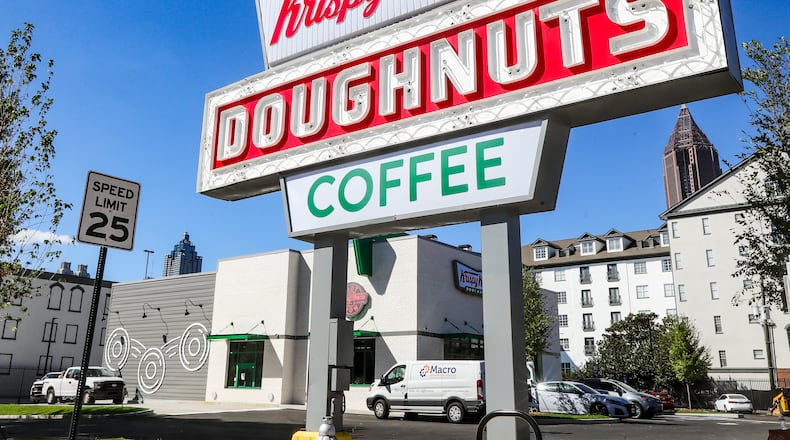 October 2, 2023 Atlanta: A promise two years in the making is set to be fulfilled. Krispy Kreme on Monday, Oct. 2, 2023 announced the grand reopening of its beloved location in Midtown Atlanta that caught on fire twice, leading to a temporary shop and then a pledge to rebuild from one of its owners, Shaquille OÕNeal. The 4,000-square-foot facility, called ÒShaqÕs Shop,Ó will open Oct. 10, two years after the NBA legend gave his word that the popular doughnut store at 295 Ponce de Leon Avenue would Òbounce back better than everÓ after a series of bad luck. ÒWe made a promise to the Ponce community and all of Atlanta and weÕre delivering on it,Ó Krispy Kreme Global Chief Brand Officer Dave Skena said in a statement. The historic building was shuttered in February 2021 because of a fire, then demolished that summer after a second blaze in July. In December 2021, the company opened a temporary pop-up store at the location with a drive-thru and limited menu, the first sign that OÕNeal and the company would deliver on their vow. The new ÒHot Light theater shopÓ will feature more than 70 employees, serving classic and limited-time offerings. While designed to be modern, it will still pay homage to Krispy KremeÕs history in the Atlanta community, as well as the original shop, which opened in 1965. It will again be open seven days a week and will also include a custom mural and plaque and a refurbishment of the distinctive heritage sign that dates to the 1960s. During grand opening week, Krispy Kreme will award 120 people a ÒCelebration Ticket,Ó which will net them a dozen free glazed doughnuts every month for a year. The company had announced construction plans and the shopÕs official name in January. ÒEveryone has been so supportive during our bounce-back process and weÕre thrilled to turn on the Hot Light. Our longstanding presence in Ponce is core to the community,Ó Skena said. ÒBeginning Oct. 10, delicious, fresh Krispy Kreme doughnuts and all the happiness that comes with enjoying and sharing them will be back.Ó (John Spink / John.Spink@ajc.com)