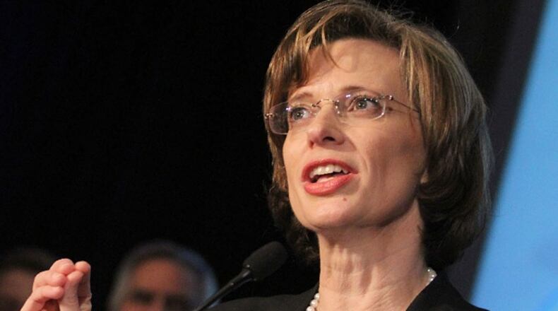 FILE - This May 20, 2014, file photo shows Democratic candidate for U.S. Senate, Michelle Nunn in Atlanta as she speaks to her supporters after her primary win was announced at an election-night watch party. Minutes after David Perdue won his Republican Senate primary in Georgia, a grainy image of Nunn was on Atlanta TV as a faceless voice slammed her as a rubber stamp for President Barack Obama. In turn, Democrats portray Perdue as a greedy executive who laid off workers. Itís all a clear indicator of what the next three months hold for a first-time Democratic candidate who may be the party's only hope for picking off a GOP-held Senate seat in November. (AP Photos/Akili-Casundria Ramsess, File)