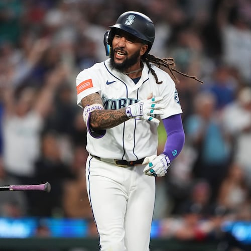 Seattle Mariners' J.P. Crawford celebrates after hitting a two-run home run against the Atlanta Braves during the sixth inning of a baseball game, Monday, May 4, 2026, in Seattle. (AP Photo/Lindsey Wasson)