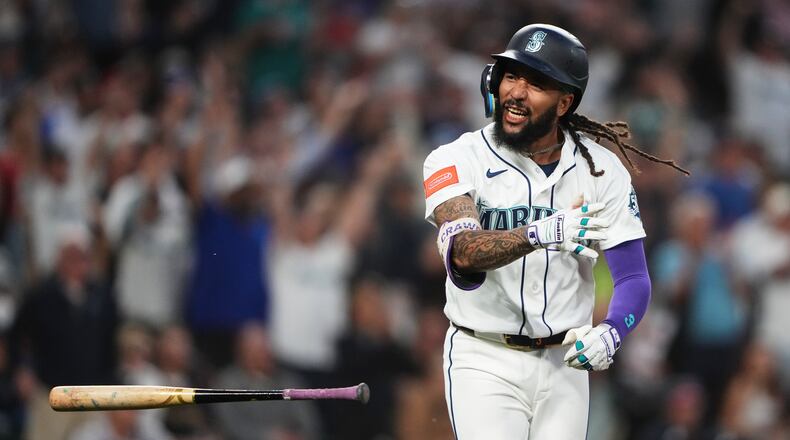 Seattle Mariners' J.P. Crawford celebrates after hitting a two-run home run against the Atlanta Braves during the sixth inning of a baseball game, Monday, May 4, 2026, in Seattle. (AP Photo/Lindsey Wasson)
