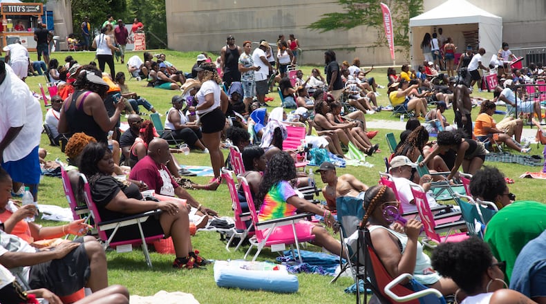 A crowd gathers on the lawn to listen to music during the FreakNik 2019 concert at the Cellairis Amphitheatre at Lakewood on Saturday, June 22, 2019. About 15,000 tickets were sold to the event. (Photo: STEVE SCHAEFER / SPECIAL TO THE AJC)