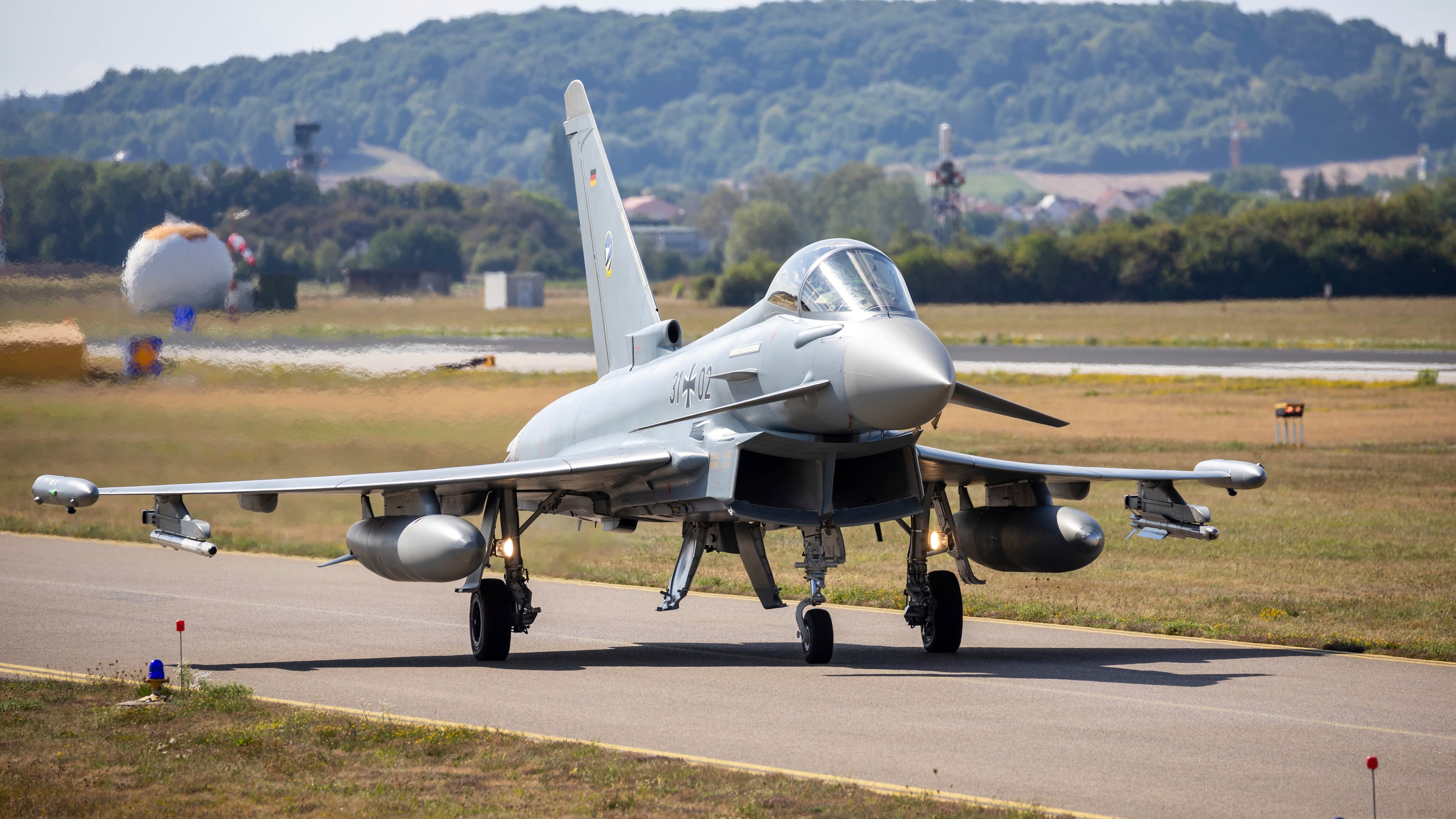 FILE - A German Eurofighter gets ready for takeoff at Neuburg Air Base in Neuburg An Der Donau, Germany, Monday Aug. 15, 2022. (Daniel Karmann/dpa via AP, File)