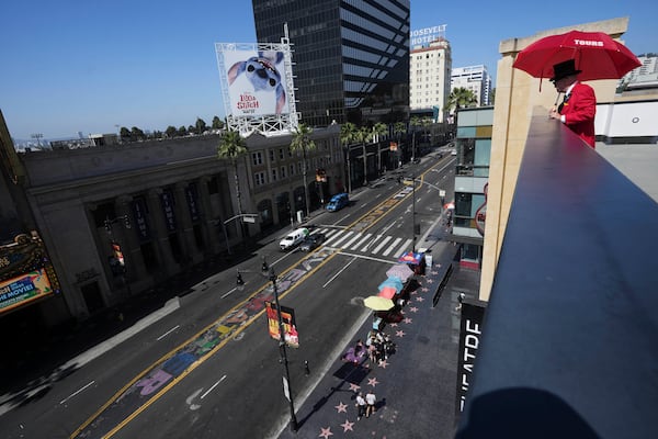 A sign reads "All Black Lives Matter" as part of an art installation Tuesday, May 20, 2025, in the Hollywood section of Los Angeles. (AP Photo/Damian Dovarganes)