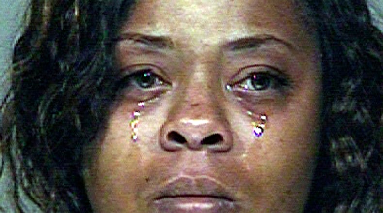 FILE - Shanesha Taylor is shown in an undated photo provided by the Scottsdale Police Department. A lawyer for Taylor, a Phoenix woman accused of leaving her children alone in a hot car while at a job interview, is hopeful his client can avoid a trial. Attorney Benjamin Taylor says he hopes a judge and prosecutors can come to some type of plea agreement Friday, July 18, 2014 for 35-year-old Shanesha Taylor, who faces two felony child abuse charges stemming from the March incident. (AP Photo/Scottsdale Police Department, File)