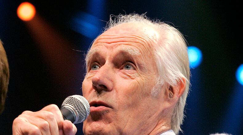 In this May 24, 2006, file photo, Beatles producer Sir George Martin answers a question from the media after the sneak preview of a new Beatles-themed Cirque du Soleil show, "Love," in Las Vegas on Wednesday, May 24, 2006. George Martin, the producer who guided the Beatles to astounding heights, has died, his manager said on March 9, 2016. He was 90.