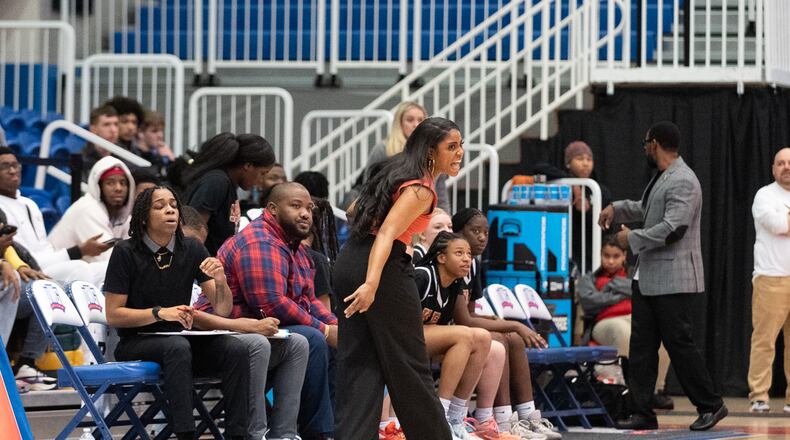 Kell's head coach shouts instruction during the GHSA AAAAA girls Kell vs Jackson basketball semifinals playoff game at West Georgia College on March 3, 2023. Jamie Spaar for the Atlanta Journal-Constitution