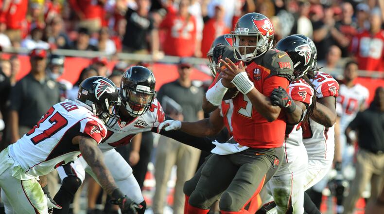 Jameis Winston made the Falcons' defense look silly (and sleepy) last Sunday. (Cliff McBride/Getty Images)