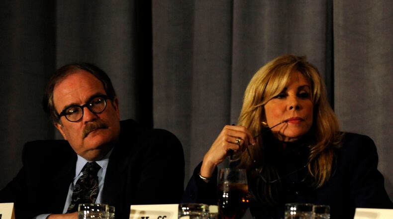 Tom Crawford, left, on a gubernatorial debate panel in 2009. AJC file