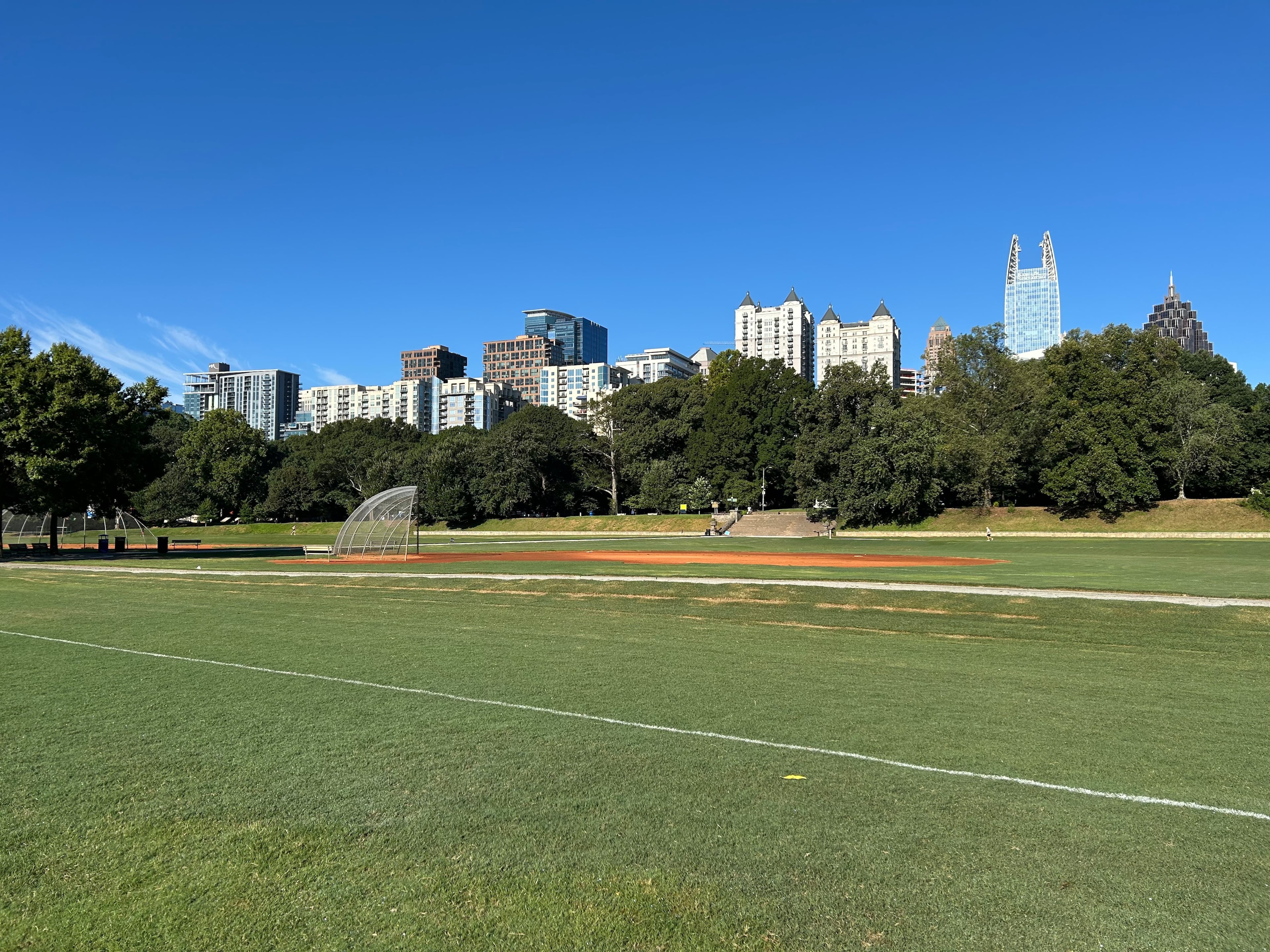 The Midtown skyline is seen from the Active Oval of Piedmont Park on a cool Wednesday morning. (Thomas Lake/AJC)