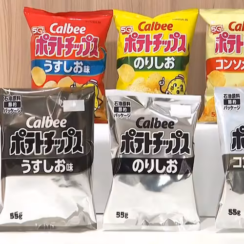 This image made from video provided by Japan's NNN-NTV shows Calbee snack packages in color and black and white in Tokyo, Wednesday, May 13, 2026. (NNN-NTV via AP)