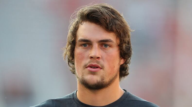 Injured Georgia quarterback Jacob Eason watches his team prepare to play Samford in a NCAA college football game on Saturday, September 16, 2017, in Athens. Curtis Compton/ccompton@ajc.com