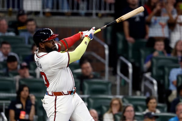 Atlanta Braves designated hitter Marcell Ozuna hits a walk off RBI during the 10th inning of a baseball game to beat the Cincinnati Reds, Tuesday, May 6, 2025, in Atlanta. (AP Photo/Butch Dill)