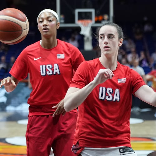 Angel Reese, of the United States, left, and United States' Caitlin Clark warm up for the Women's Basketball World Cup quarterfinal match between the United States and Hungary in Berlin, Thursday, Sept. 10, 2026. (AP Photo/Ebrahim Noroozi)