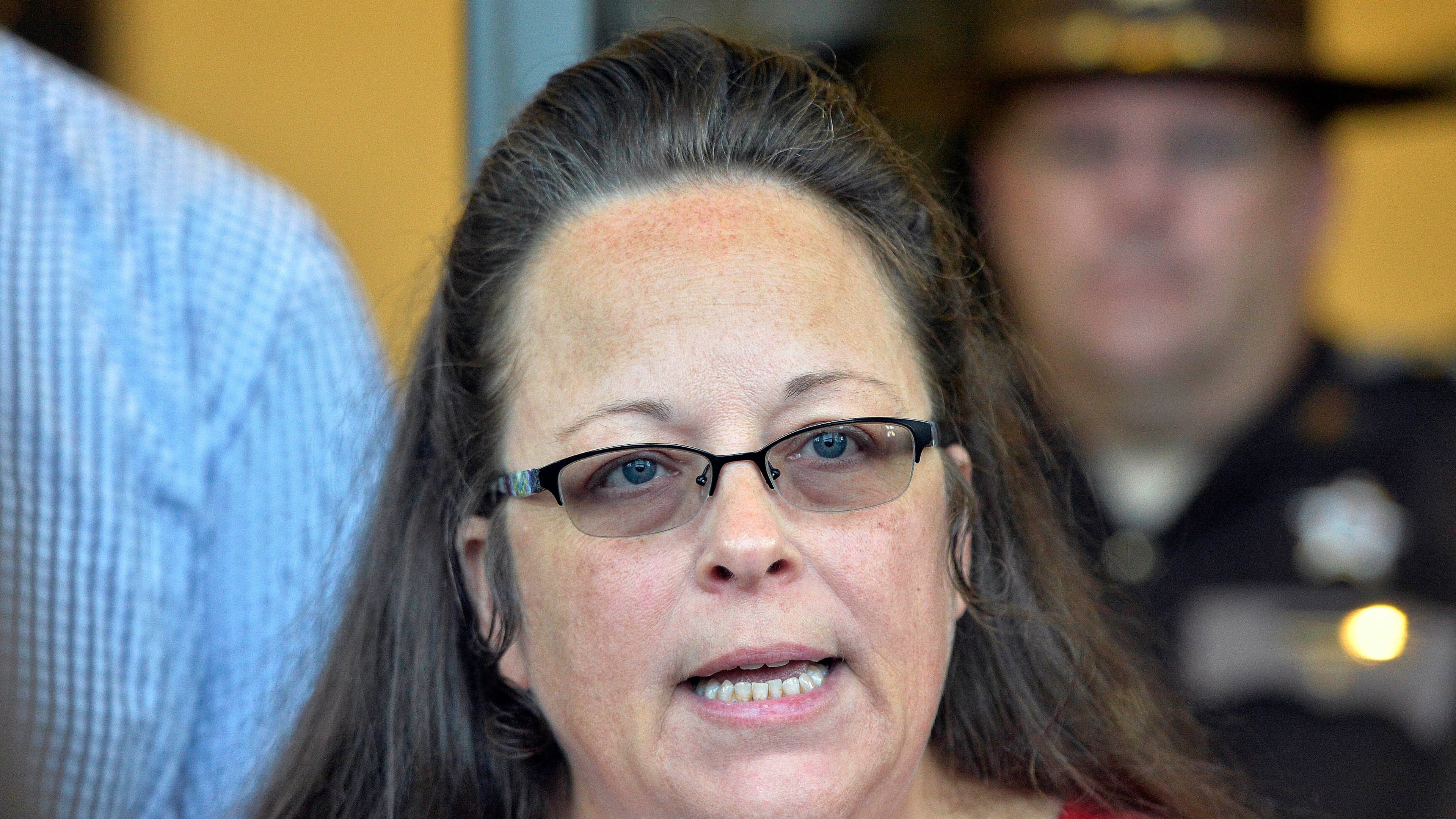FILE - Rowan County Clerk Kim Davis makes a statement to the media at the front door of the Rowan County Judicial Center in Morehead, Ky. Sept. 14, 2015. (AP Photo/Timothy D. Easley, File)