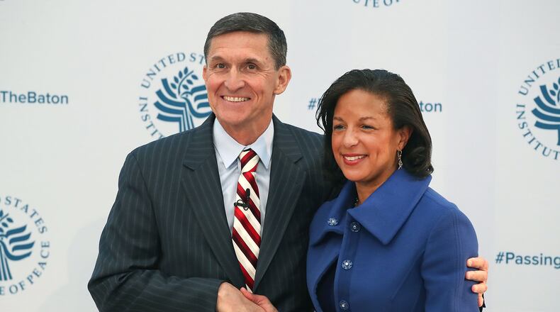 WASHINGTON, DC - JANUARY 10: White House National Security Adviser Susan Rice, shakes hands with incoming White House National Security Advisor Gen. Michael Flynn, during the 2017 Passing The Baton conference at the United States Institute of Peace, on January 10, 2017 in Washington, DC. (Photo by Mark Wilson/Getty Images)