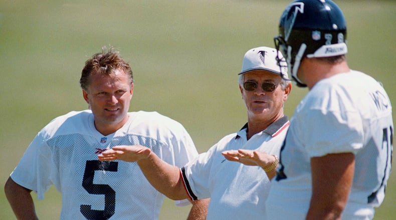 Atlanta Falcons coach Dan Reeves, center, breaks it down for kicker Morten Andersen (5), and center Dave Widell, right, during one long ago 1998 practice. (AP Photo/Erik S. Lesser)