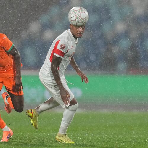 Ivory Coast's Vakoun Bayo and Mozambique's Mexer compete for the ball during the Africa Cup of Nations group F soccer match between Ivory Coast and Mozambique in Marrakech, Morocco, Wednesday, Dec. 24, 2025. (AP Photo/Themba Hadebe)