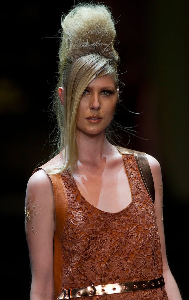 Models show off their hair on the runway