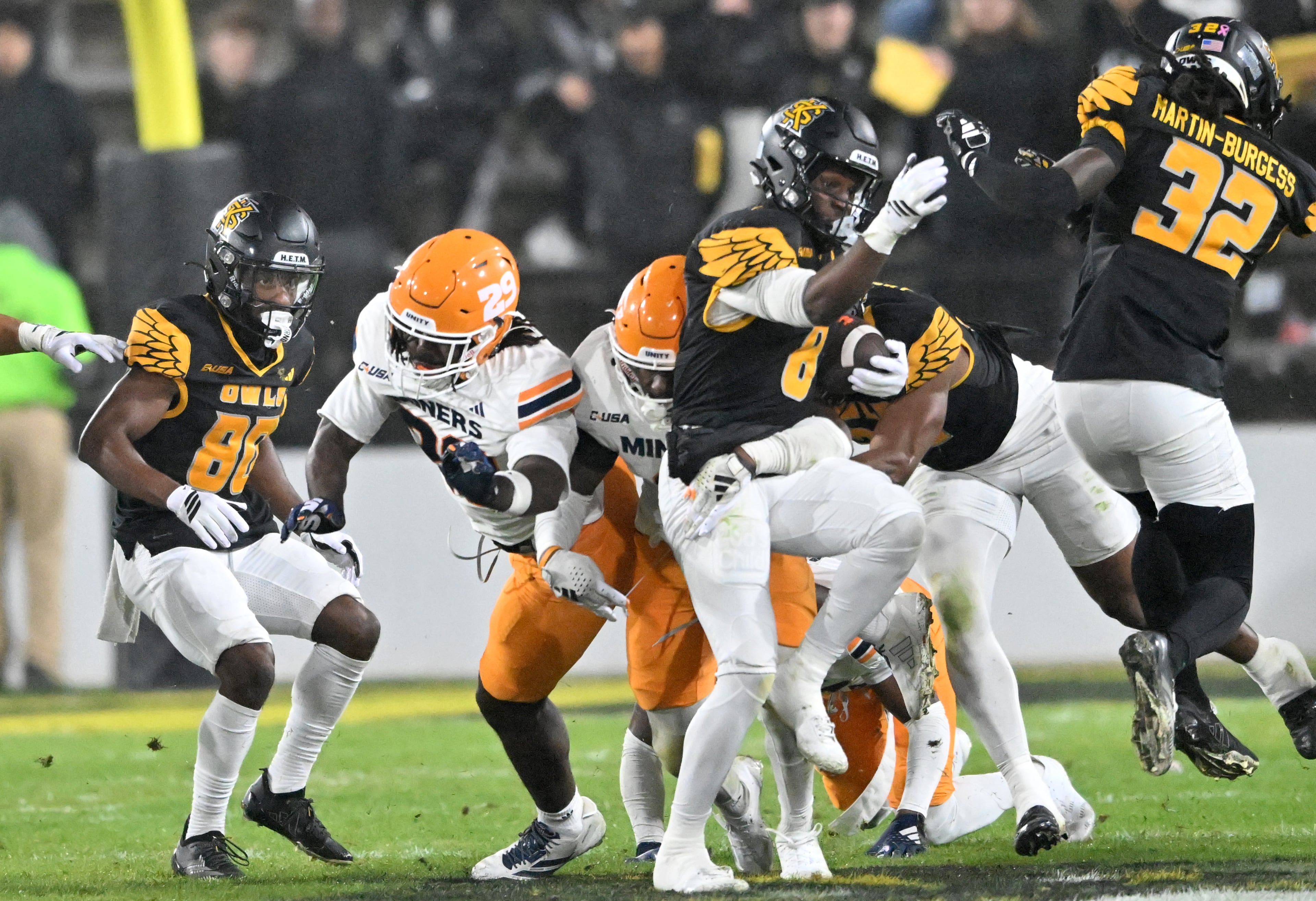 Kennesaw State running back Tykeem Wallace (8) runs the ball during the second half in an NCAA college football game at Fifth Third Stadium, Tuesday, October 28, 2025 in Kennesaw. Kennesaw State won 33-20 over University of Texas at El Paso. (Hyosub Shin / AJC)