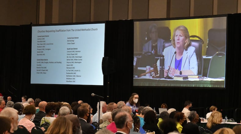 June 2, 2022  Athens - Bishop Sue Haupert-Johnson (on screen) speaks before delegates in the North Georgia Conference of the United Methodist Church vote to ratify the disaffiliation agreements during the 2022 North Georgia Annual Conference at the Classic Center in Athens on Thursday, June 2, 2022. Delegates in the North Georgia Conference of the United Methodist Church voted overwhelming Thursday to allow about 70 member churches to voluntarily leave the conference as a result of their disagreement largely over the issue of full inclusion of the LGBTQ community. (Hyosub Shin / Hyosub.Shin@ajc.com)