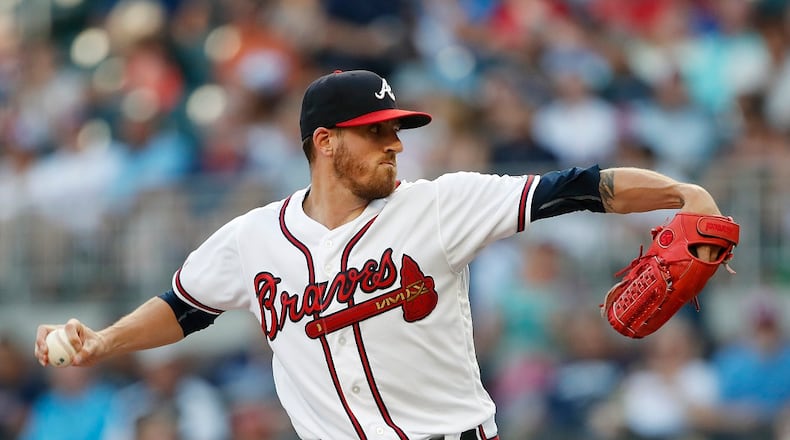 Atlanta Braves starting pitcher Kevin Gausman (45) works against the Washington Nationals Wednesday, May 29, 2019, in Atlanta. (AP Photo/John Bazemore)