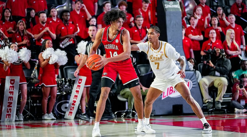Georgia forward Asa Newell (14) gets ready to put up one of this 18 shots against Notre Dame Tuesday night at Stegeman Coliseum. The 6-foot-11 freshman forward led the Bulldogs with 20 points and 11 rebounds in a 69-49 victory played before 8,045 in Athens. (Tony Walsh/UGA Athletic Association)