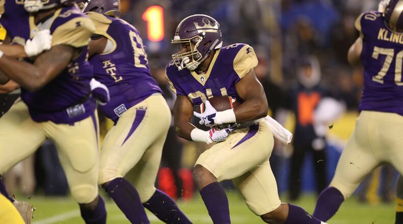 Atlanta Legends running back Lawrence Pittman (24) rushes for a short gain in the first half of an AAF football game between the Atlanta Legends and the San Diego Fleet, Sunday, Feb. 17, 2019, at SDCCU Stadium in San Diego, Calif. (Peter Joneleit via AP Photo)