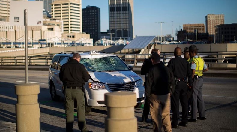 A man was hit by a car on Centennial Olympic Park Drive Friday (Photo by Branden Camp).