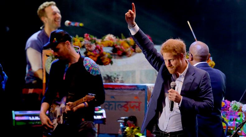 LONDON, ENGLAND - JUNE 28: Prince Harry is seen on stage during the Sentebale Concert at Kensington Palace on June 28, 2016 in London, England. Sentebale was founded by Prince Harry and Prince Seeiso of Lesotho over ten years ago. It helps the vulnerable and HIV positive children of Lesotho and Botswana. (Photo by Matt Dunham - WPA Pool/Getty Images)