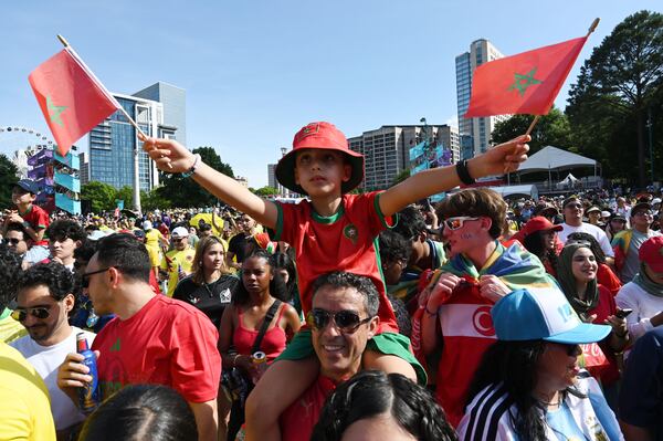 Local Moroccan fans cheer as they gather for a watch party ahead of the match against Brazil at the FIFA Fan Festival in Centennial Olympic Park on Saturday, June 13, 2026, in Atlanta. (Hyosub Shin/AJC)