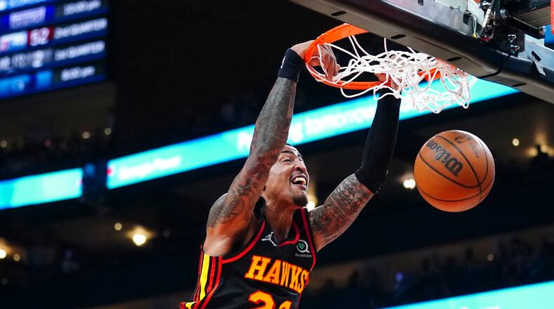Hawks forward John Collins dunks during the first half against the Pacers earlier this season. Collins could give the Hawks a boost in the postseason because he is the team’s second-leading scorer (16.2 points per game) and rebounder (7.8 per game). (AP Photo/John Bazemore)