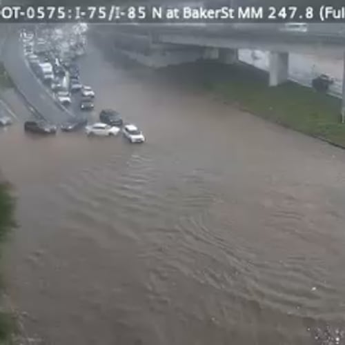 A Georgia DOT camera shows flash flooding on the Downtown Connector in Atlanta after heavy rain hit the city during rush hour on Wednesday, May 20, 2026. (Courtesy of GDOT)