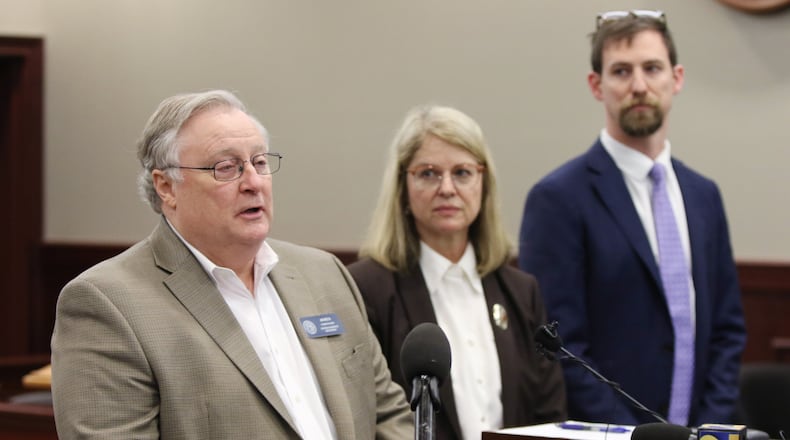 Jim Beck, commissioner of the Georgia Insurance Department, speaks at a press conference about an insurance fraud bust in a courtroom at the Clayton County Superior Court in Jonesboro , Georgia on Friday, March 1, 2019. Three victims of the insurance fraud, mainly elderly people, have been identified so far. EMILY HANEY / AJC