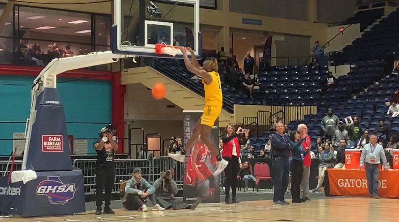 Jeff Davis' Ja'Queze Kirby dunks during the GHSA's annual slam dunk contest on Saturday, March 7, 2020 at the Macon Centreplex. (Adam Krohn for the AJC)