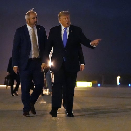 President Donald Trump walks to board Air Force One, Tuesday, Aug. 4, 2026, at Los Angeles International Airport in Los Angeles. (AP Photo/Mark Schiefelbein)