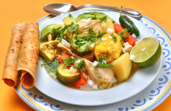 201130 Decatur, Ga: Mexican chicken soup with cilantro, jalapenos, avocado and lime (with corn tortillas). Photos for Jennifer Zyman story on souped up soups for the holidays. Photos taken Tuesday December 1, 2020 at the home of the photographer. (Styling and photos by Chris Hunt and Jennifer Zyman for The Atlanta Journal-Constitution)