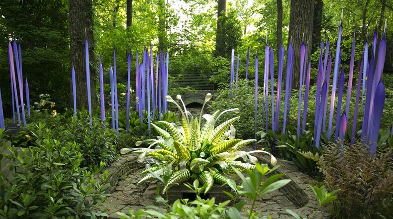 “Green Hornets and Waterdrops” (2016) and “Neodymium Reeds” (2014), part of “Chihuly in the Garden” at Atlanta Botanical Garden. CONTRIBUTED BY JASON GETZ, ATLANTA BOTANICAL GARDEN