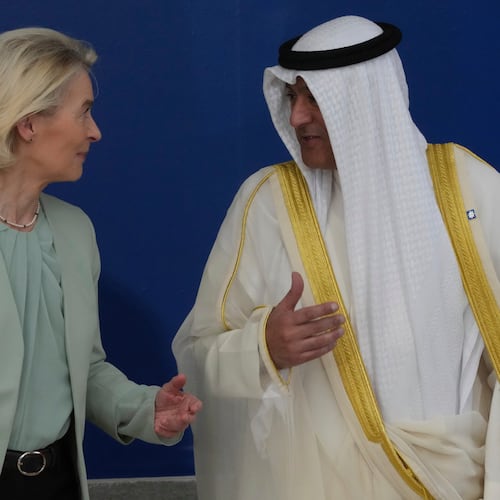 European Commission President Ursula von der Leyen, left, speaks with the Gulf Cooperation Council Secretary General Jasem Mohamed Albudaiwi before a family photo of the EU Summit in Nicosia, Cyprus, Friday, April 24, 2026. (AP Photo/Petros Karadjias)