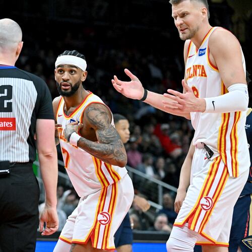 Atlanta Hawks guard Nickeil Alexander-Walker (center) appeals to a referee during the second half of a game against the New Orleans Pelicans at State Farm Arena, Wednesday, Jan. 7, 2026, in Atlanta. (Hyosub Shin/AJC)