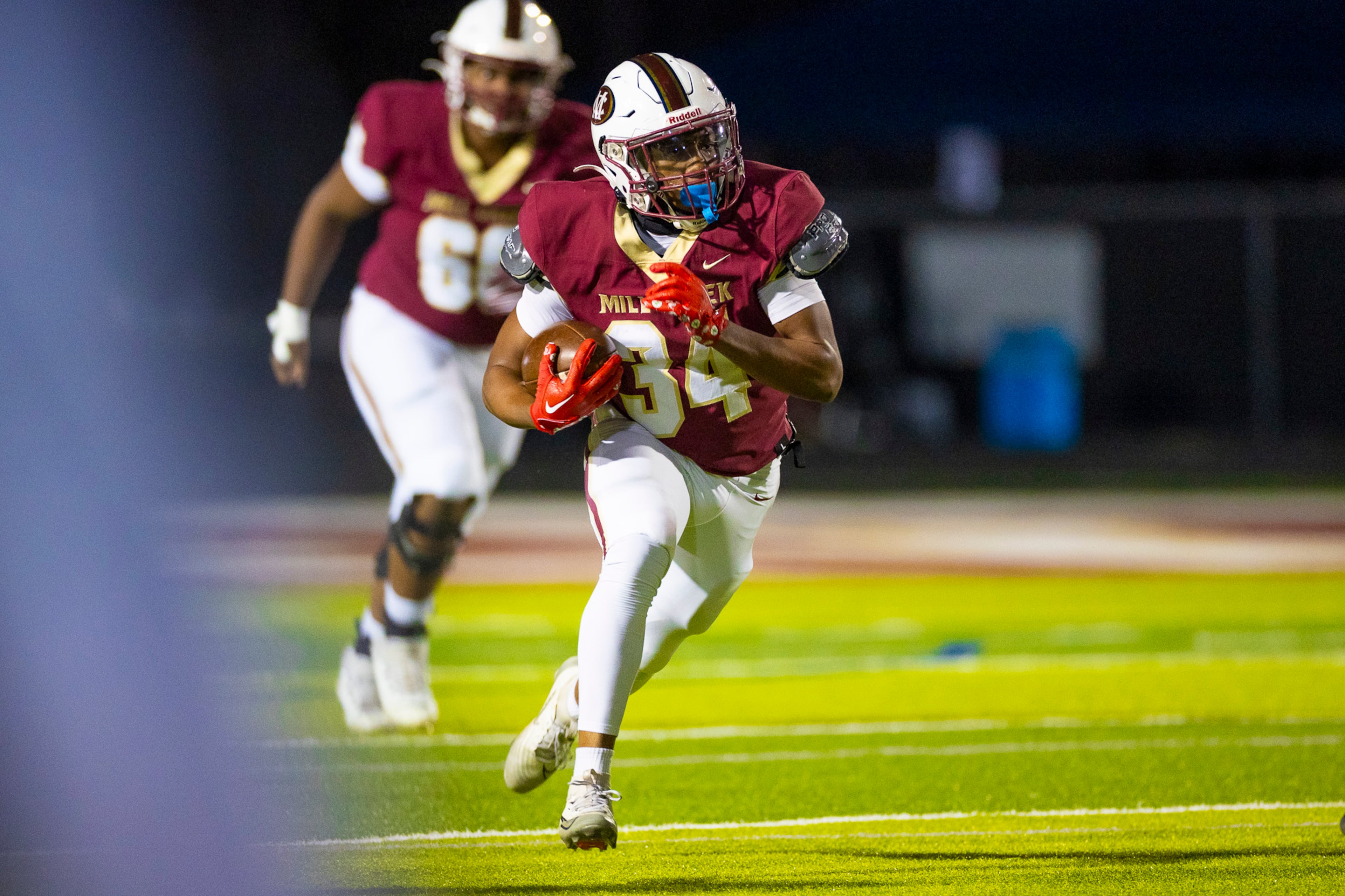 Mill Creek running back Nick Tuck (34) runs with the ball during the first half against Colquitt at Mill Creek Community Stadium in Hoschton on Nov. 14th, 2025. (Oscar Guevara Saenz for the AJC)